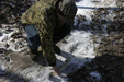 Patrick with footprint in the ice